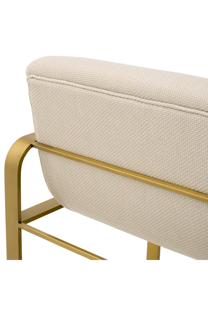 Chaise de bar en laiton brossé et en tissu sable | Eichholtz Olsen | Meubleluxe.fr