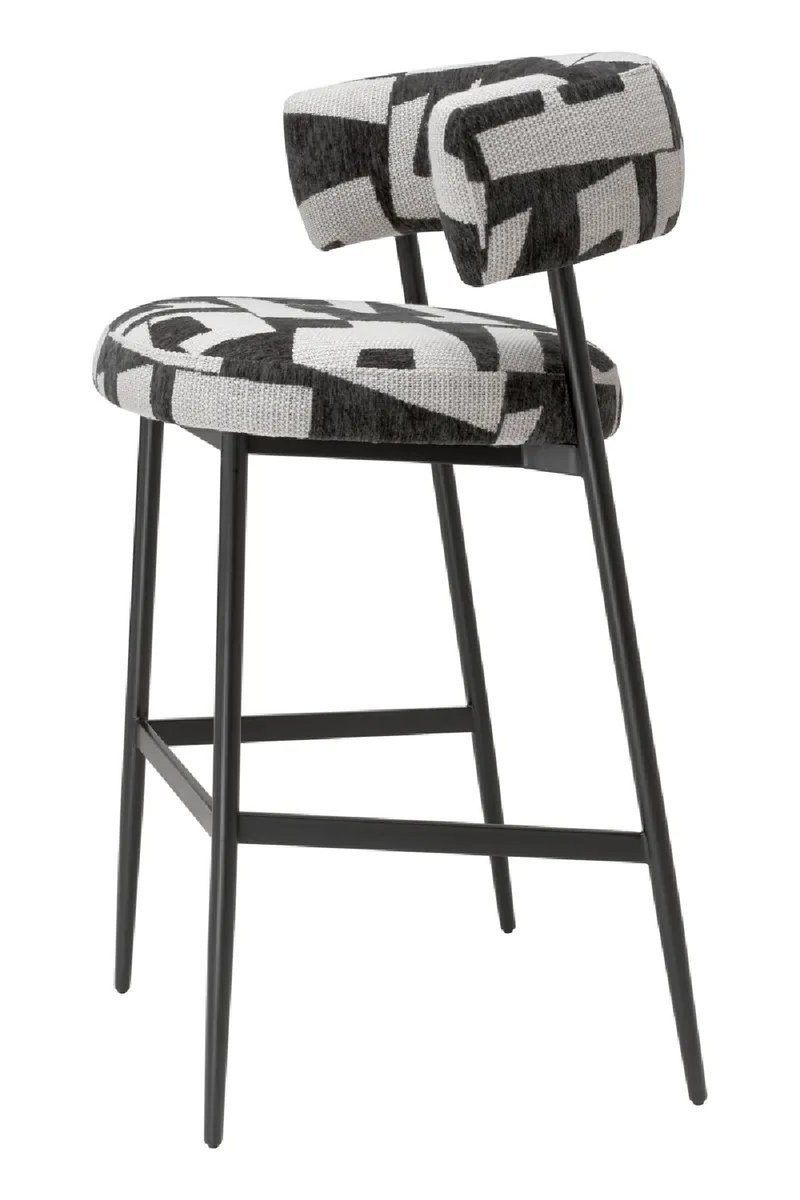 Tabouret de bar rembourré Brooklyn en noir avec pieds noirs | Eichholtz Folsom | Meubleluxe.fr