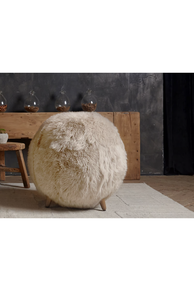 Real sheepskin armchair | Andrew Martin