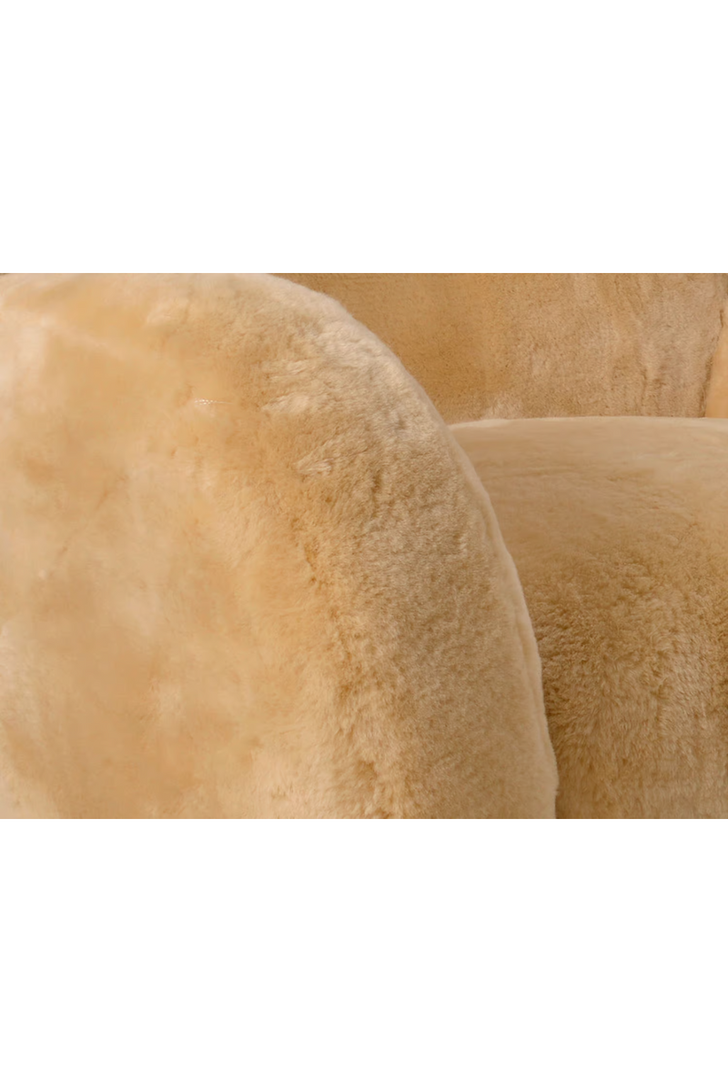 Real sheepskin armchair | Andrew Martin