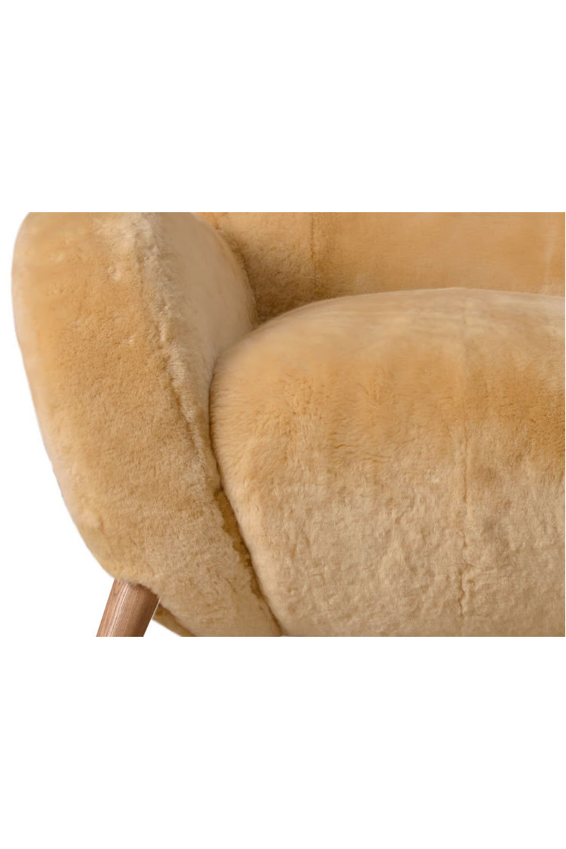 Real sheepskin armchair | Andrew Martin