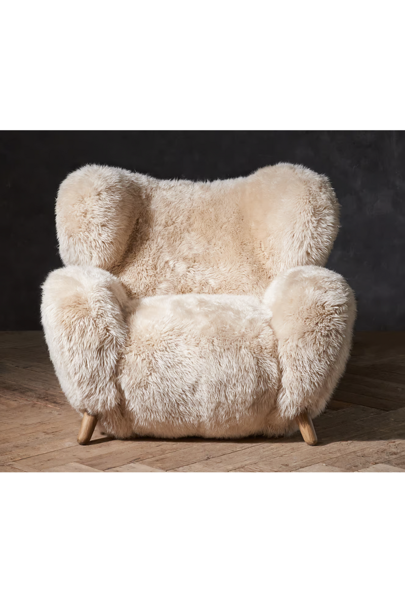 Real sheepskin armchair | Andrew Martin