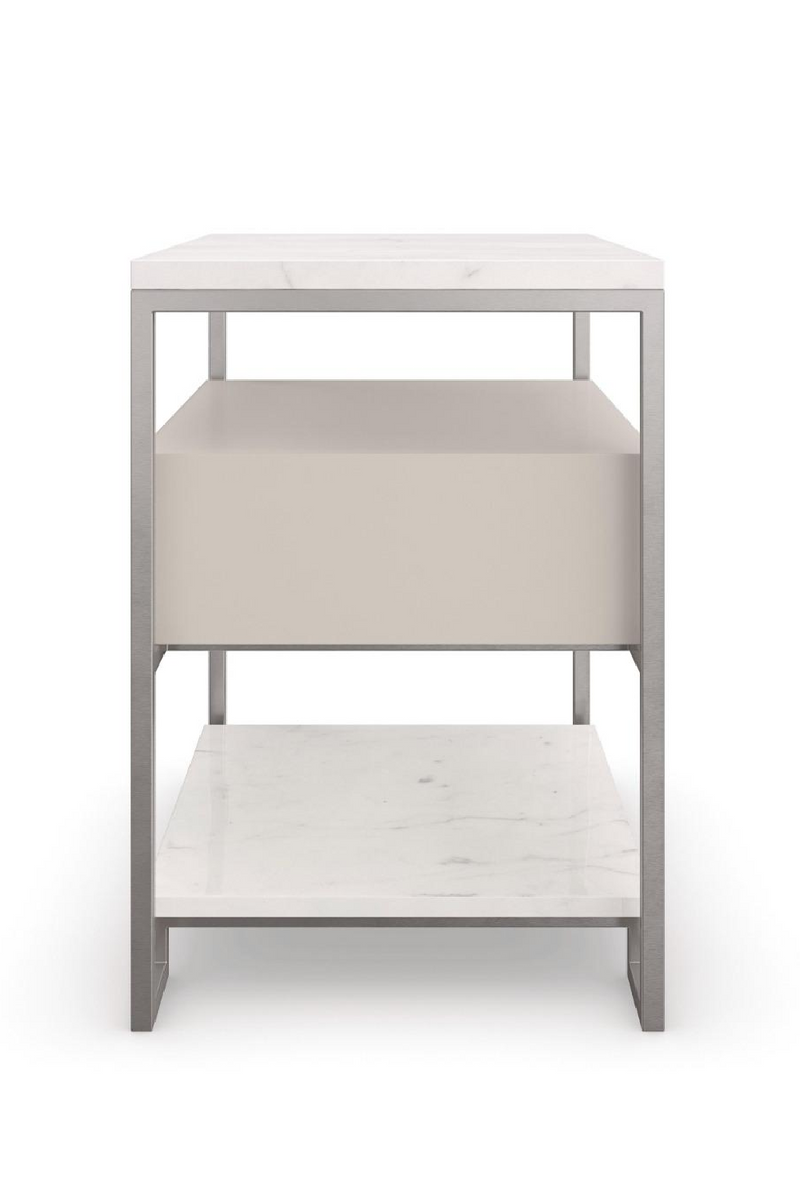 Table de chevet en marbre blanc et acier brossé | Caracole Marbleous | Meubleluxe.fr