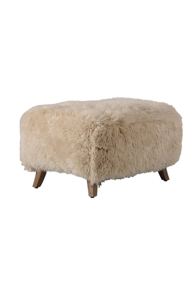 Real sheepskin armchair | Andrew Martin