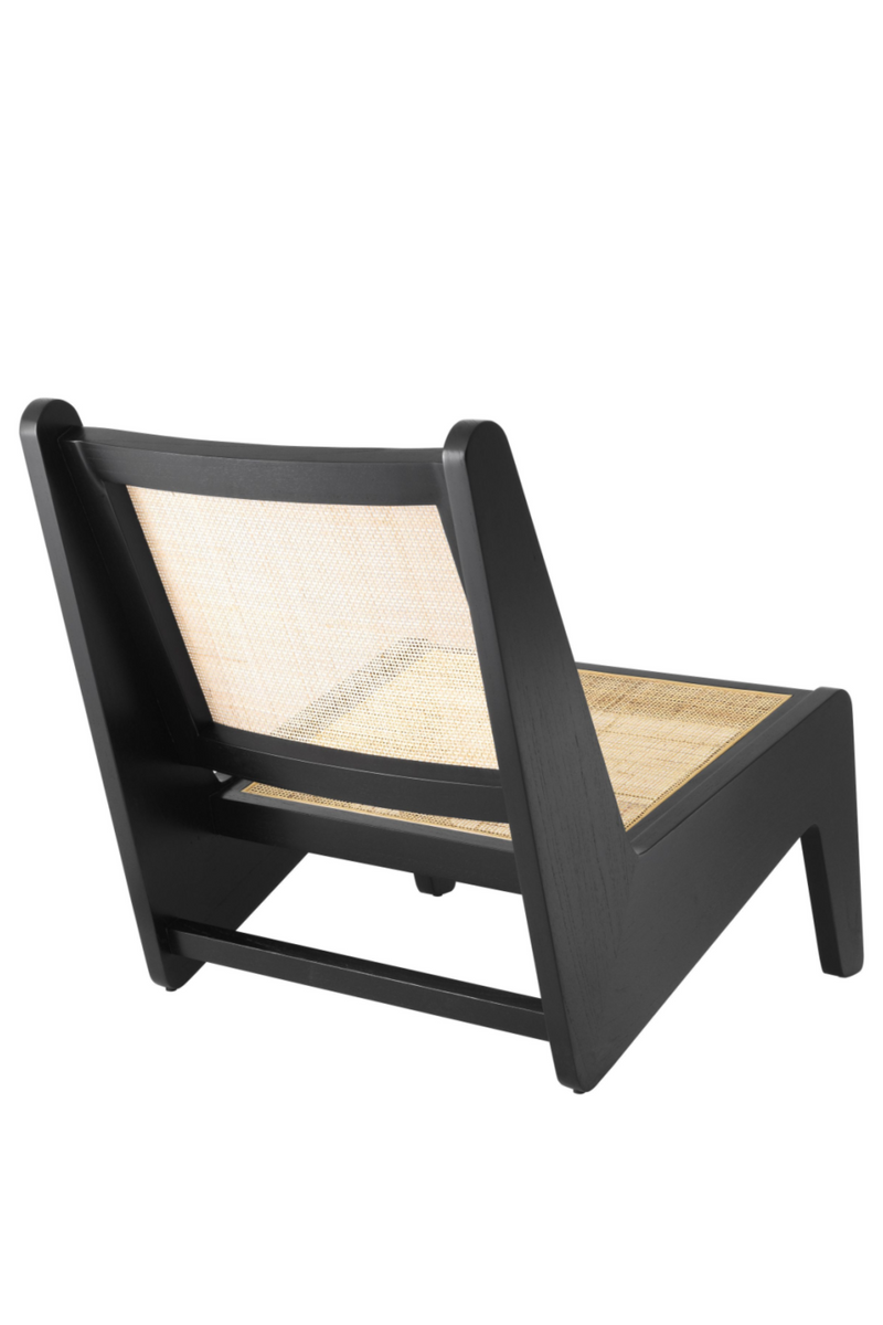 Chaise inclinée noire en rotin | Eichholtz Aubin | Meubleluxe.fr