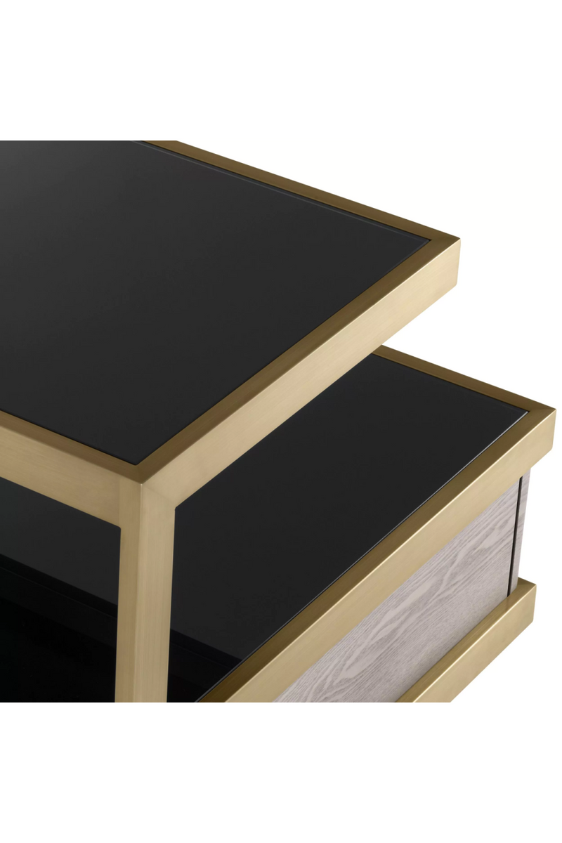 Table d'appoint en laiton brossé et verre noir | Eichholtz Kuboa | Meubleluxe.fr