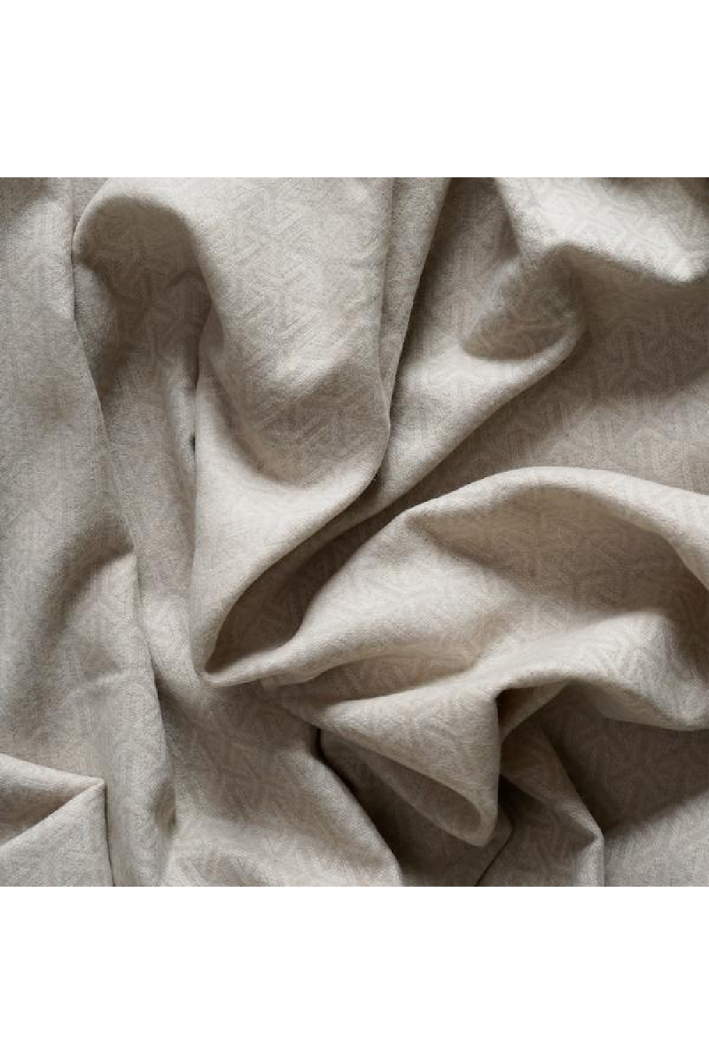 Plaid géométrique en laine et cachemire Nude | Andrew Martin Monte | Meubleluxe.fr