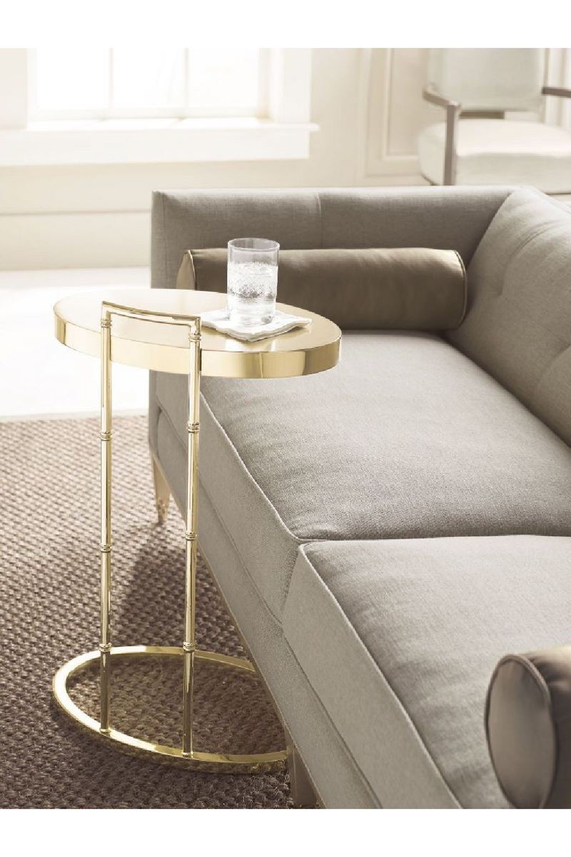 Table d'appoint ovale en métal doré | Caracole Spot | Meubleluxe.fr