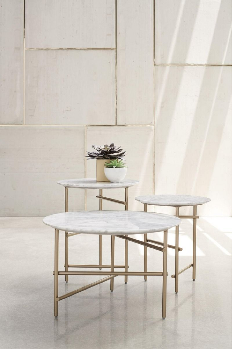 Table basse en laiton et marbre blanc | Caracole Concentric | Meubleluxe.fr